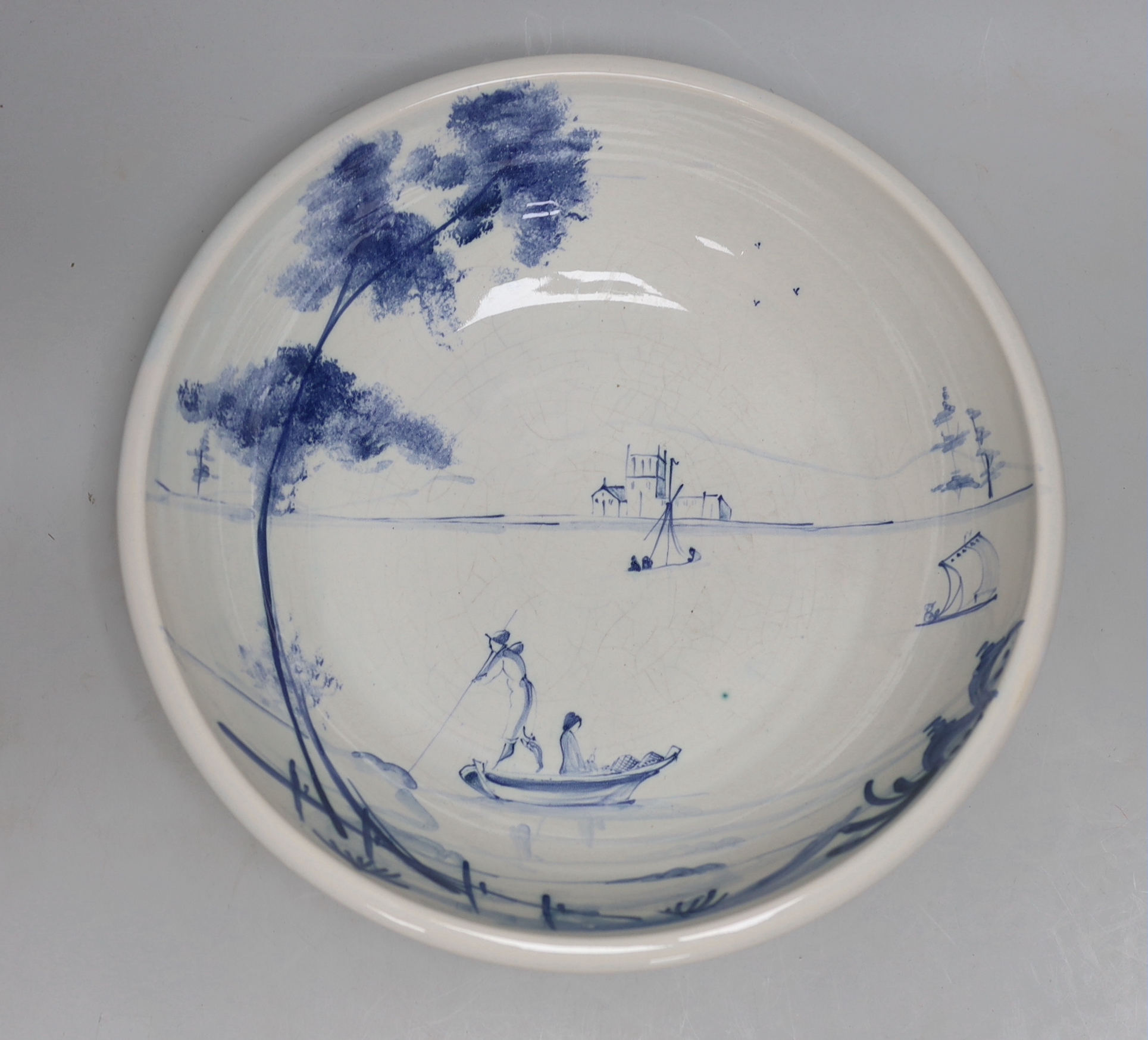Deborah Sears for ISIS ceramics, blue and white bowl, hand painted with figures in boats, mark to the base, 33cm in diameter